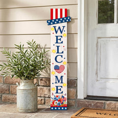 Foutcheou assembled sign on porch creating inviting holiday entry
