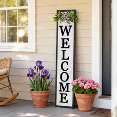 Foutcheou front view showing bold black welcome sign for curb appeal