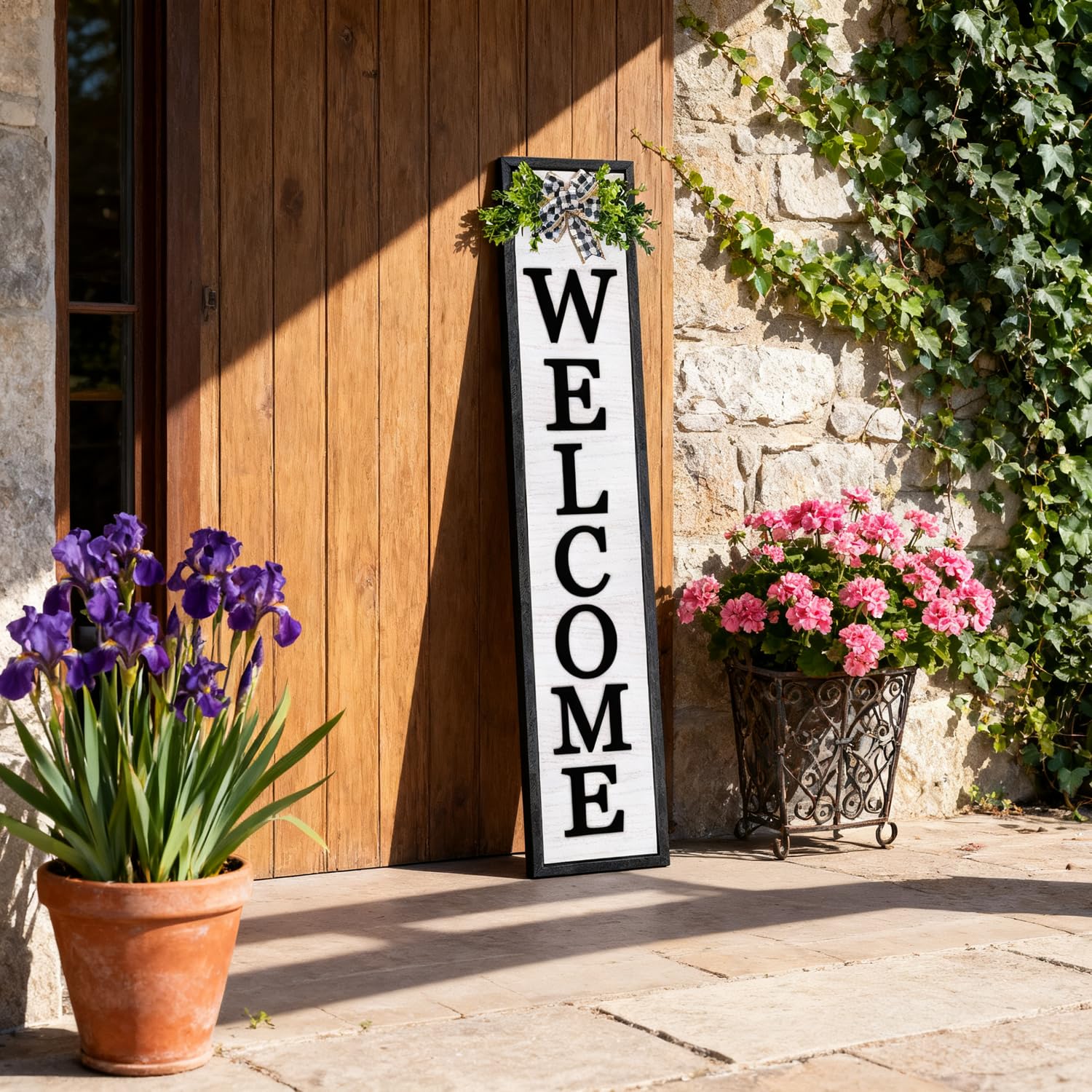 Foutcheou sign in a styled porch setting creating inviting curb charm