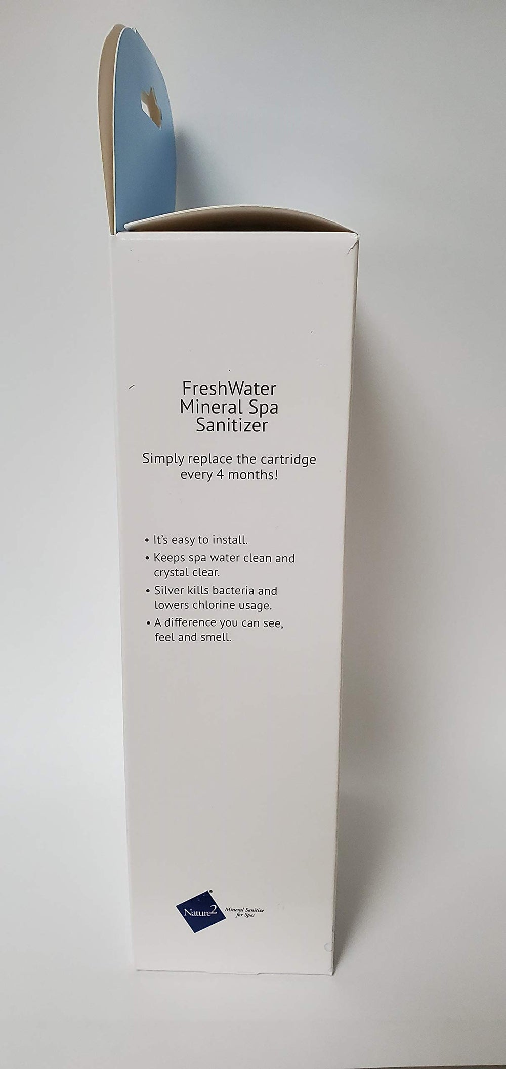 FreshWater cartridge installed in spa ozone housing, provides continuous supplemental sanitization