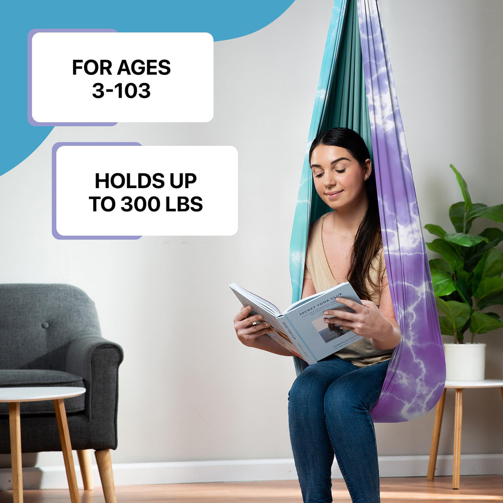 FRIENDLY CUDDLE adult reclining in pod for a relaxing sensory break