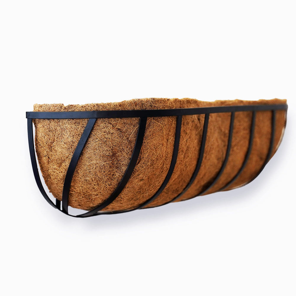 Frillybutts planter beside handrail showing 24-inch size and correct fit benefit.