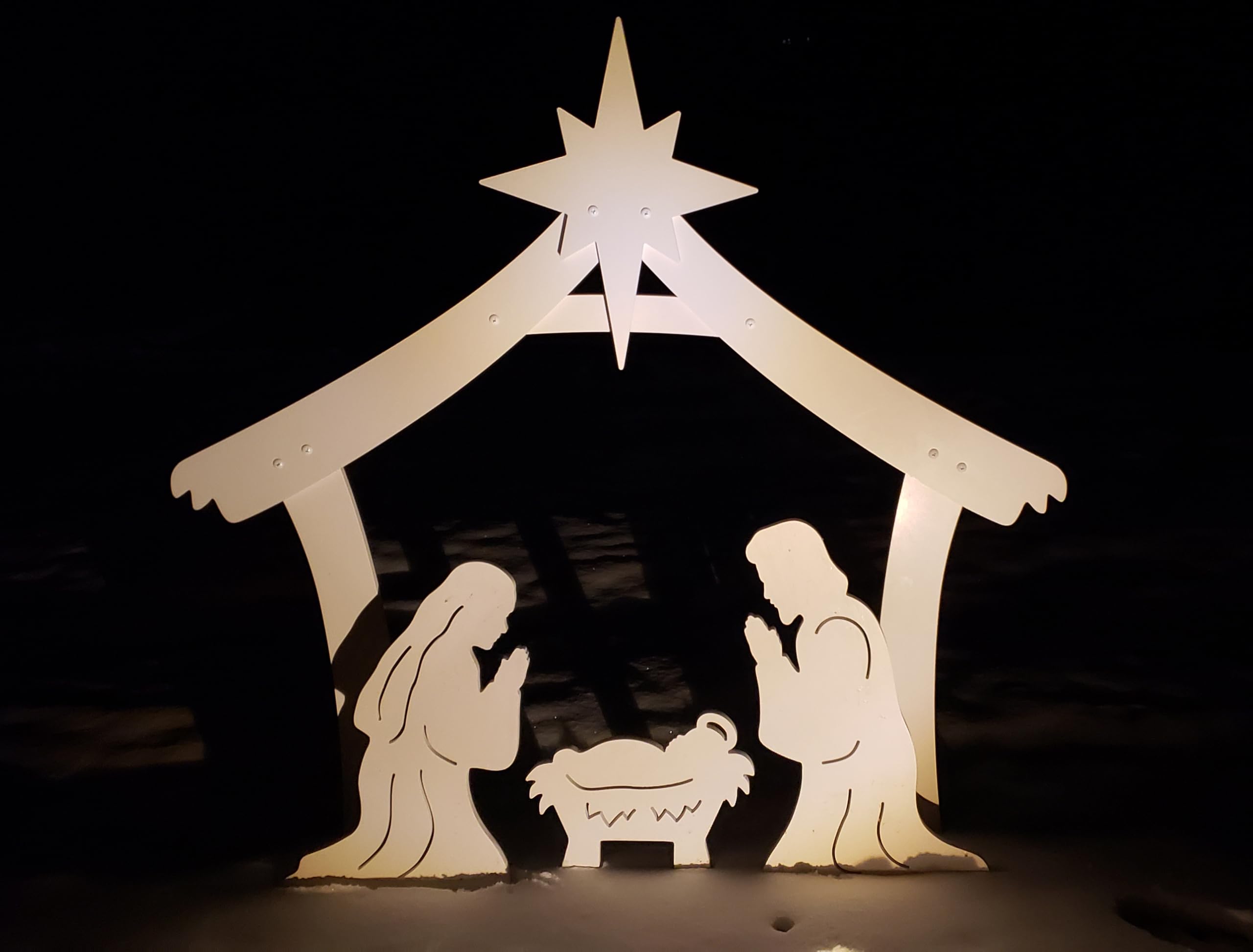 FrontYard Originals nativity beside person to show scale and visual impact