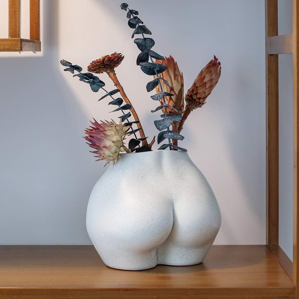 FROZZUR bottom showing drainage holes and hand-painted detailing for plant health