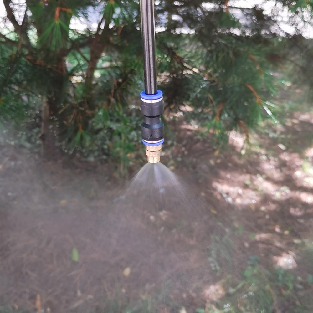 FUJINIRRI 82ft tubing next to tape measure showing area coverage