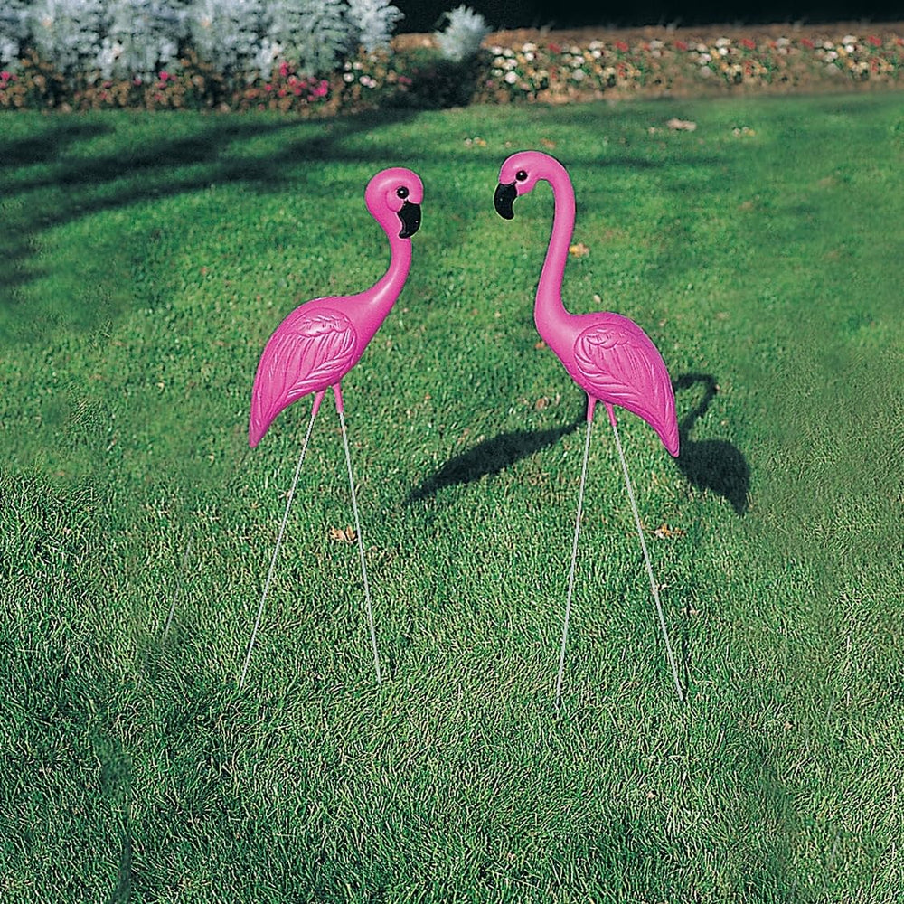 Fun Express pink flamingos in lawn lifestyle display adding whimsical tropical charm
