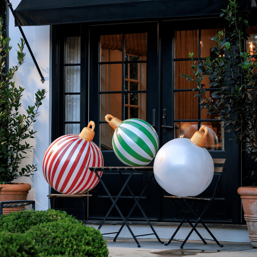 FUNBOY trio lit at night in a yard showing colorful LEDs and visual impact