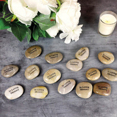 Funeral Favors stone held in hand showing smooth texture and comforting keepsake feel