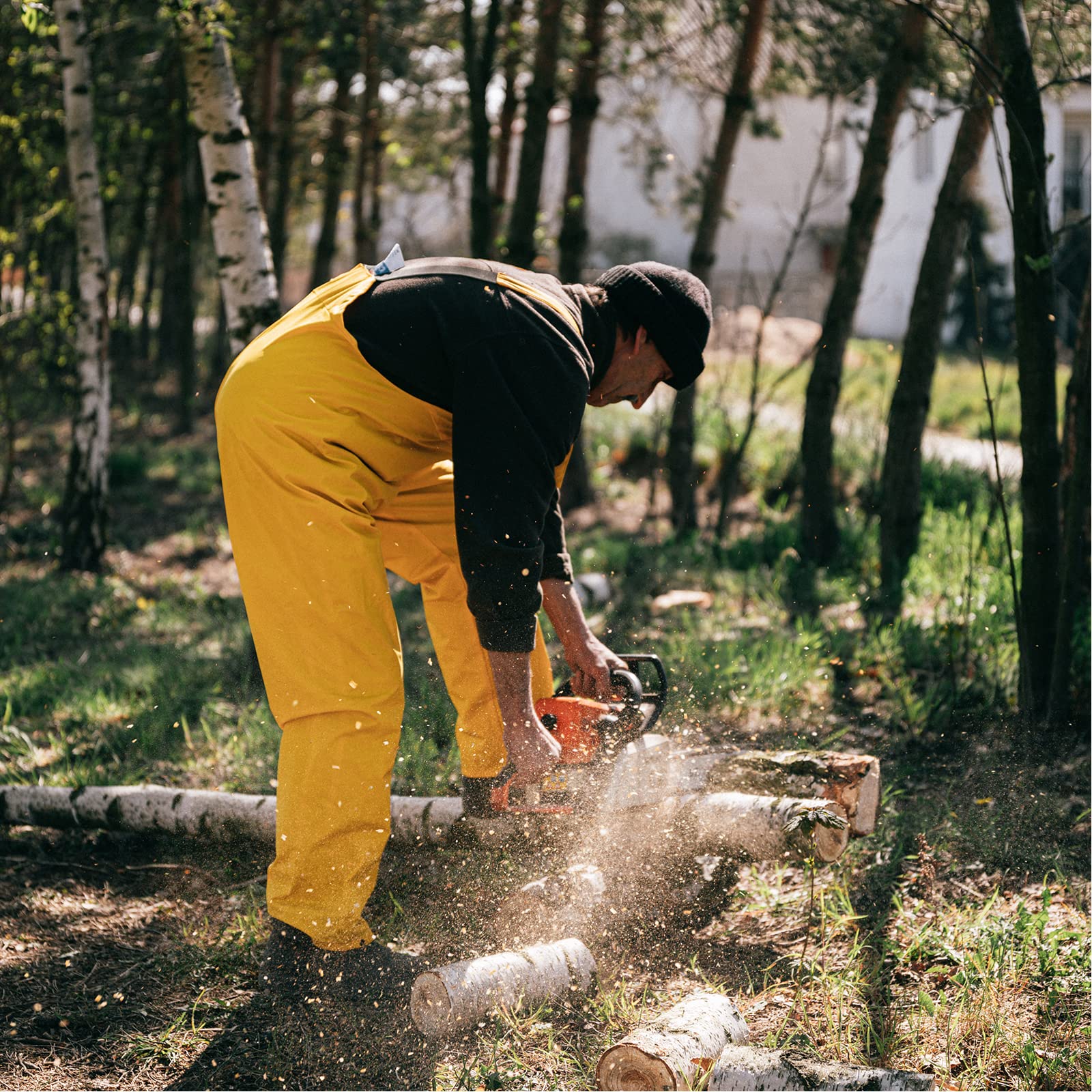 FUNKYWOO chainsaw in use limbing a branch for efficient cutting