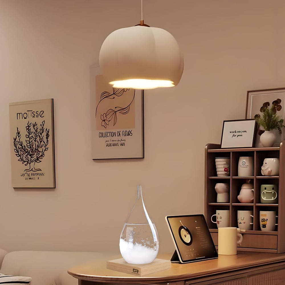FUNOHYE storm glass next to a book showing x-large size and scale
