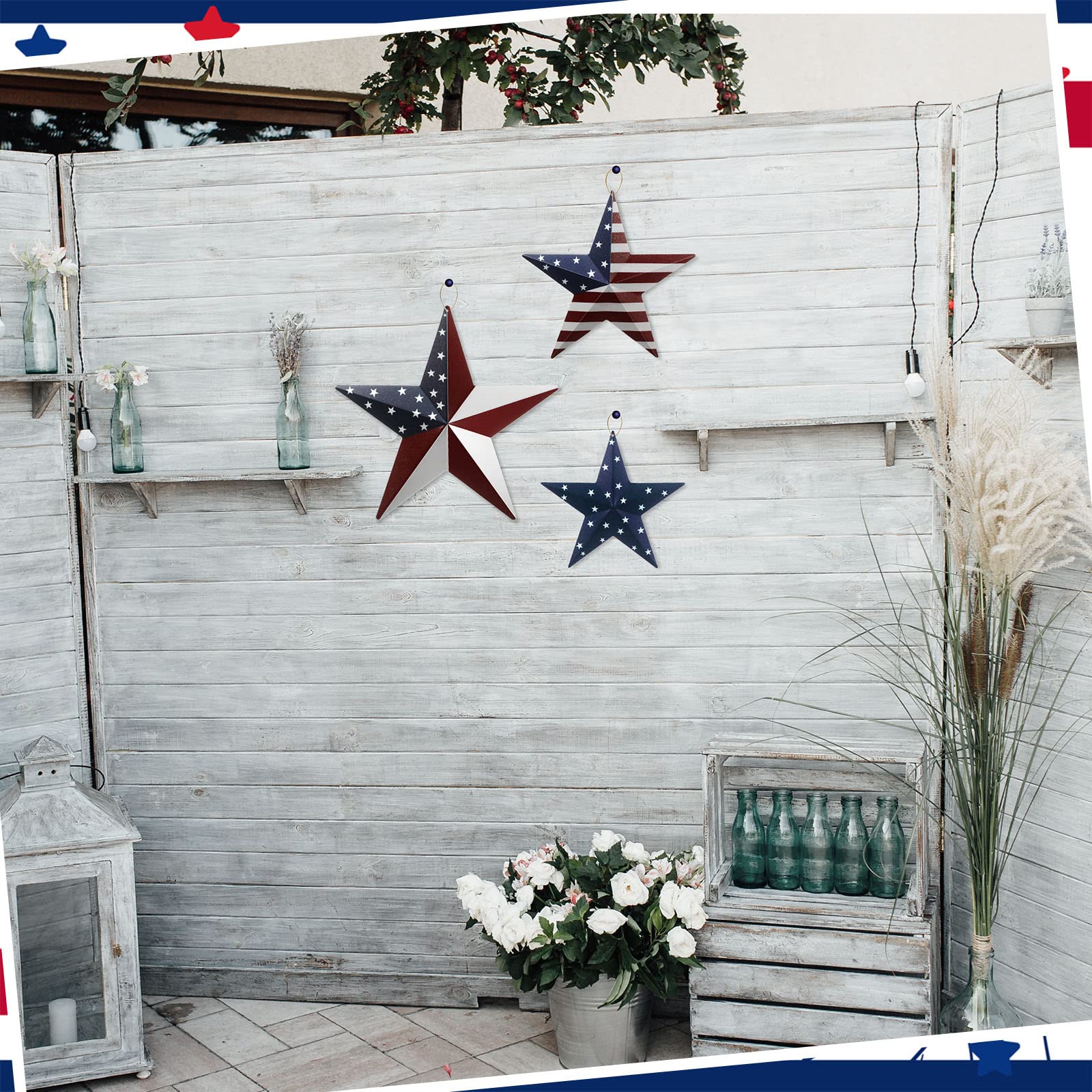 Funrous three stars attached to garden fence for outdoor festive styling
