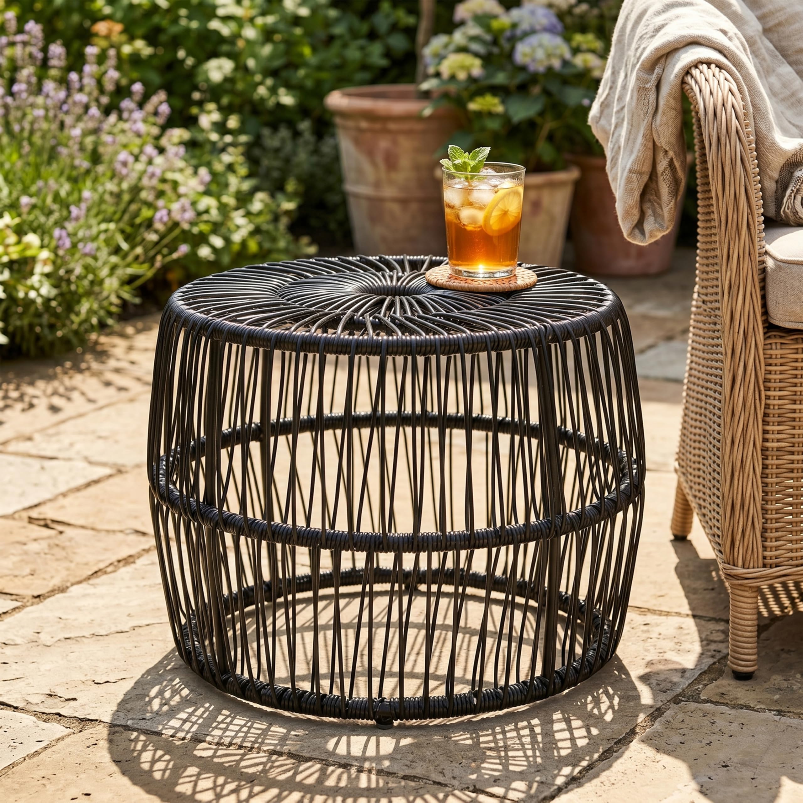 Furniture of America Ysar front view showing round black rattan table and balance