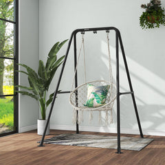 G TALECO GEAR hammock stand in use on patio demonstrating relaxed seating
