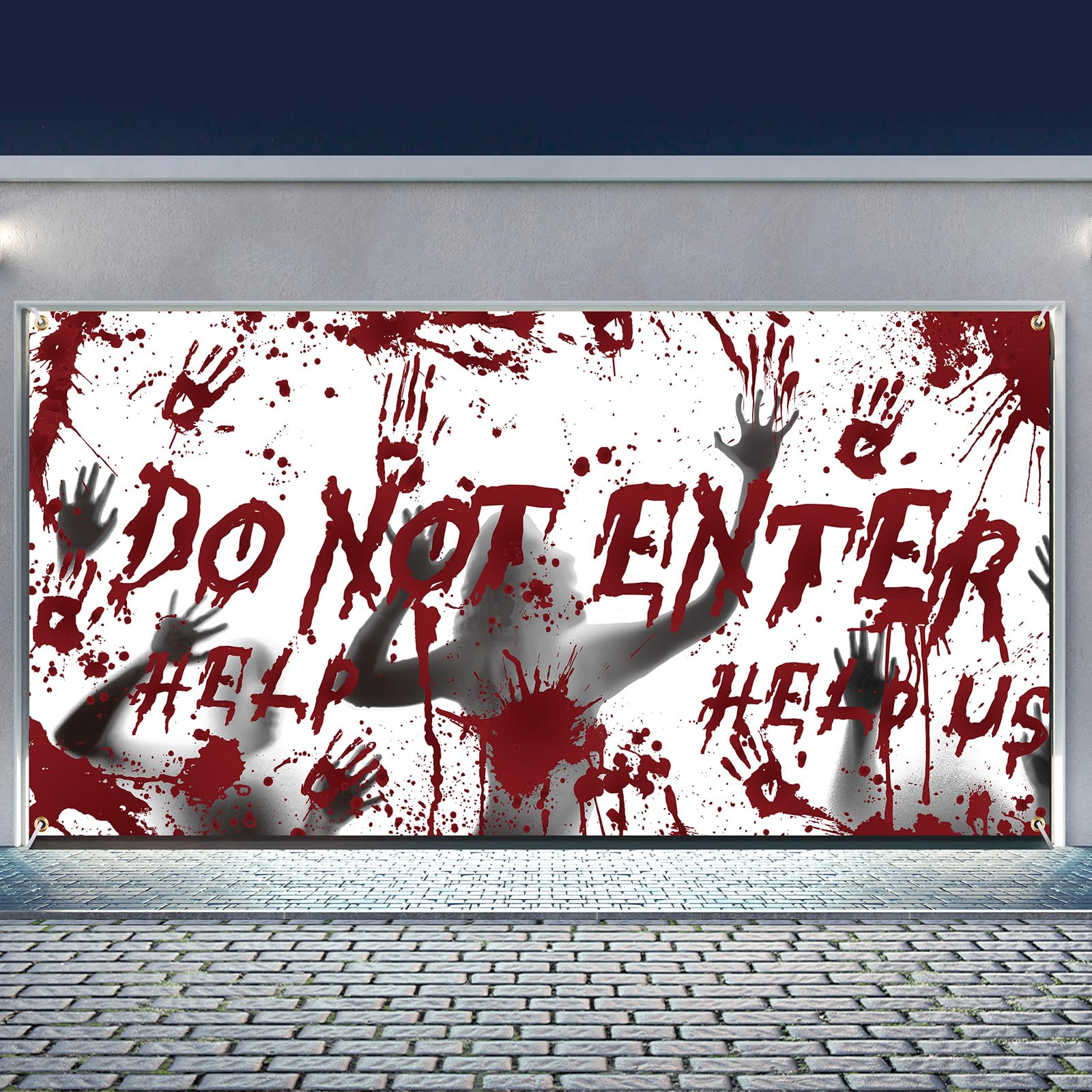 Ganeen banner lit at night creating spooky atmosphere for trick-or-treaters