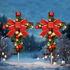 Ganeen front view of two packaged cross stakes showing complete memorial set and ease