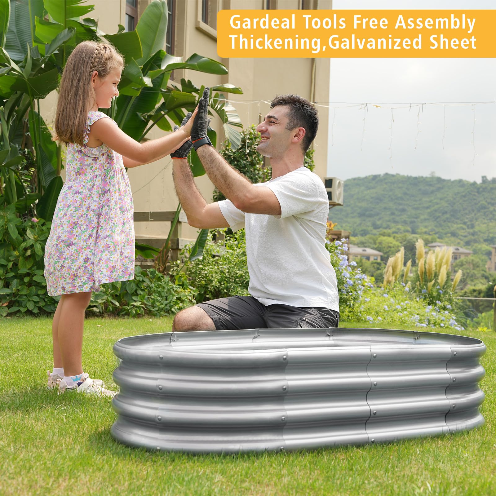 Gardeal raised bed next to gardening tools to show compact size and easy access