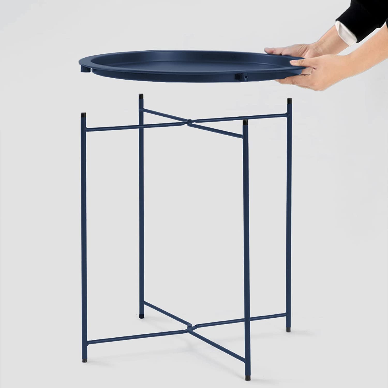 Garden 4 you table styled next to sofa providing convenient surface for drinks and decor