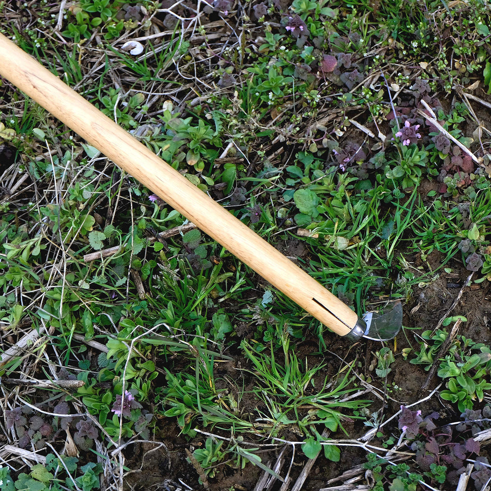 Garden Helper handle and hanger detail showing sturdy grip and easy storage benefit