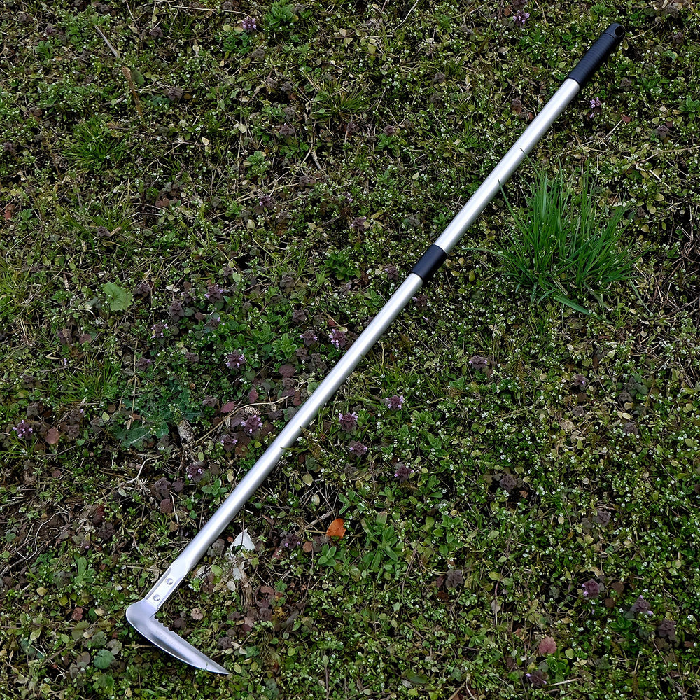 Garden Helper serrated blade detail for cutting tough grass and fibrous weeds efficiently