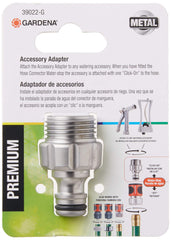 Gardena adapter connecting nozzle to quick connector demonstrating fast tool change