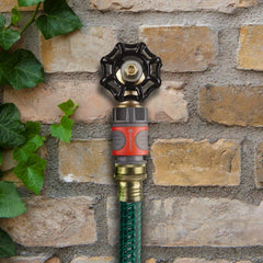 Gardena adapter next to ruler for scale showing compact size advantage