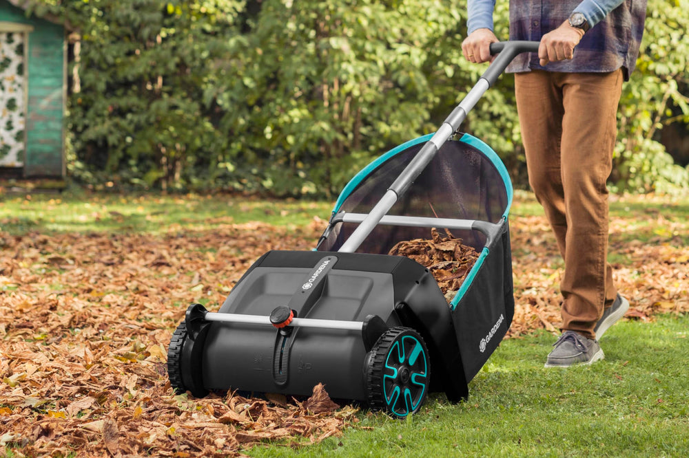 GARDENA rotating brush detail illustrating robust pickup action on grass