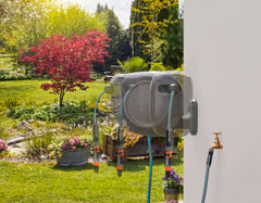 GARDENA wall bracket displayed at 180-degree swivel for flexible watering