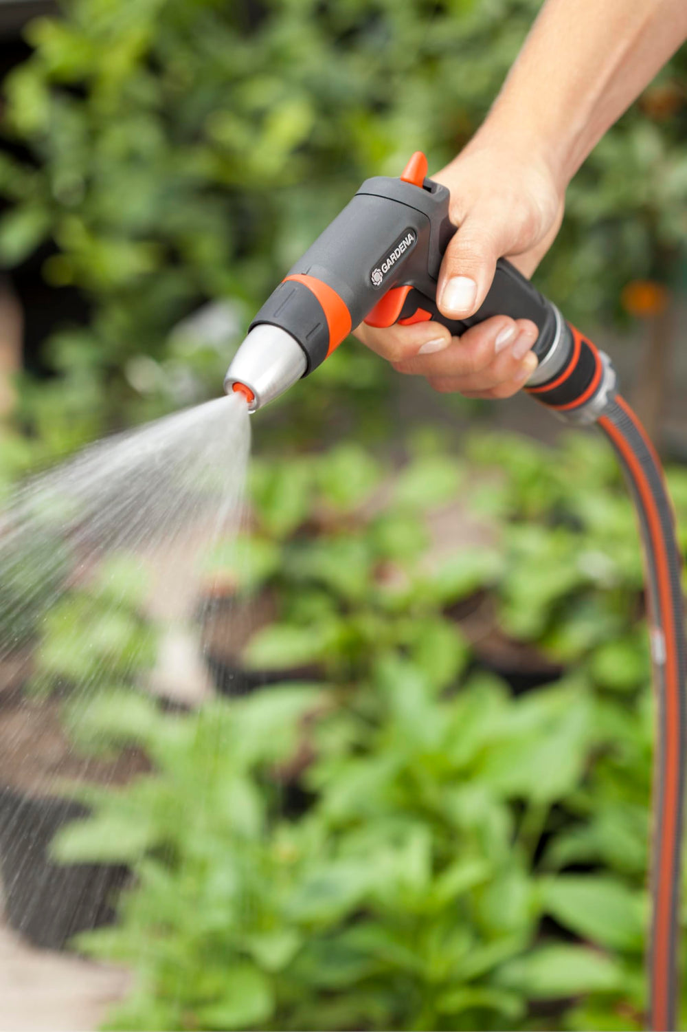Gardena watering delicate plants with fine mist preserving fragile seedlings