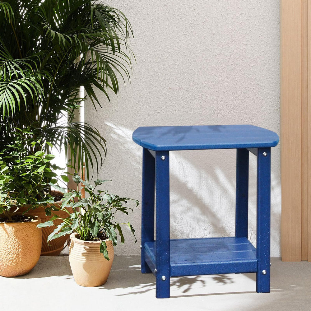 GARDENSTAR table next to Adirondack chair showing compact scale and fit