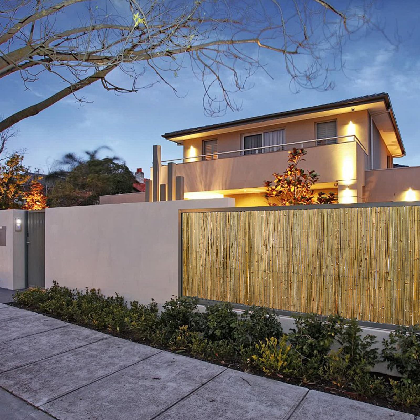 Gardgue bamboo panel as garden backdrop creating a tropical, inviting atmosphere