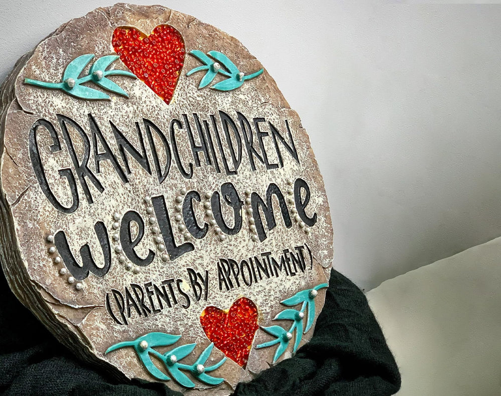 GARDY lifestyle scene as grandparents receive the decorative garden gift