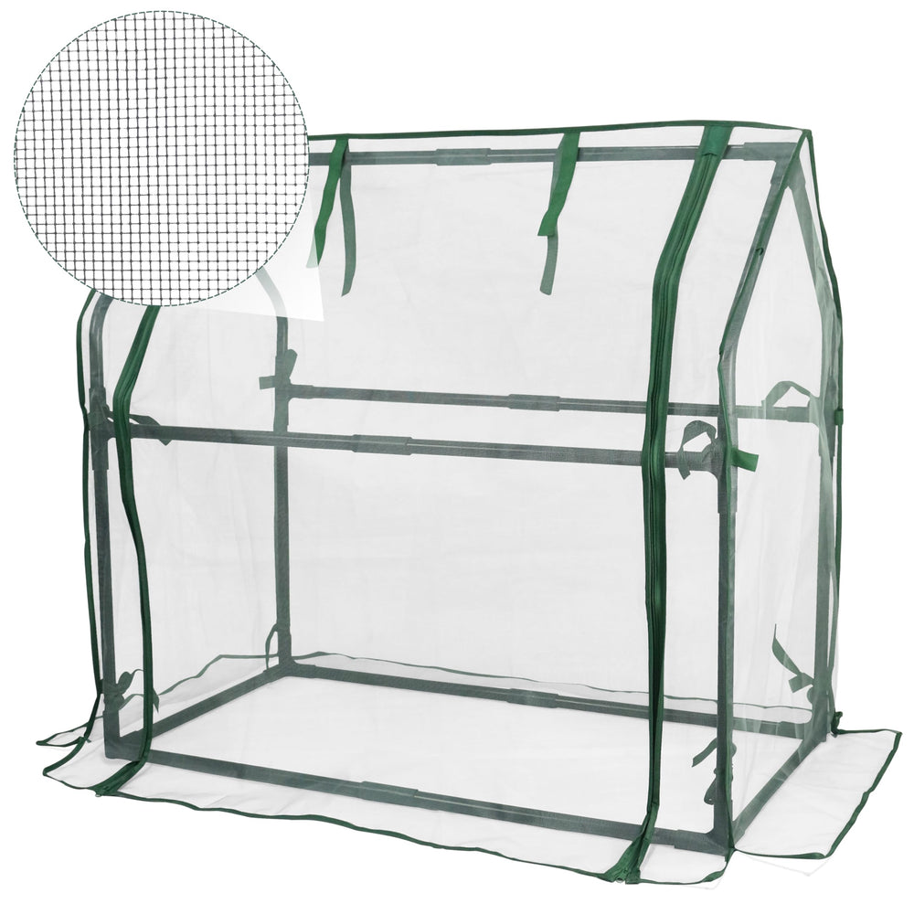 Gardzen front view of assembled mini greenhouse showing protected plants and neat footprint