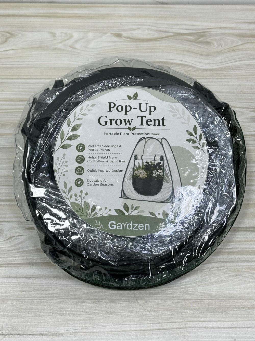 Gardzen ground stakes anchoring the tent to prevent uplift and shifting