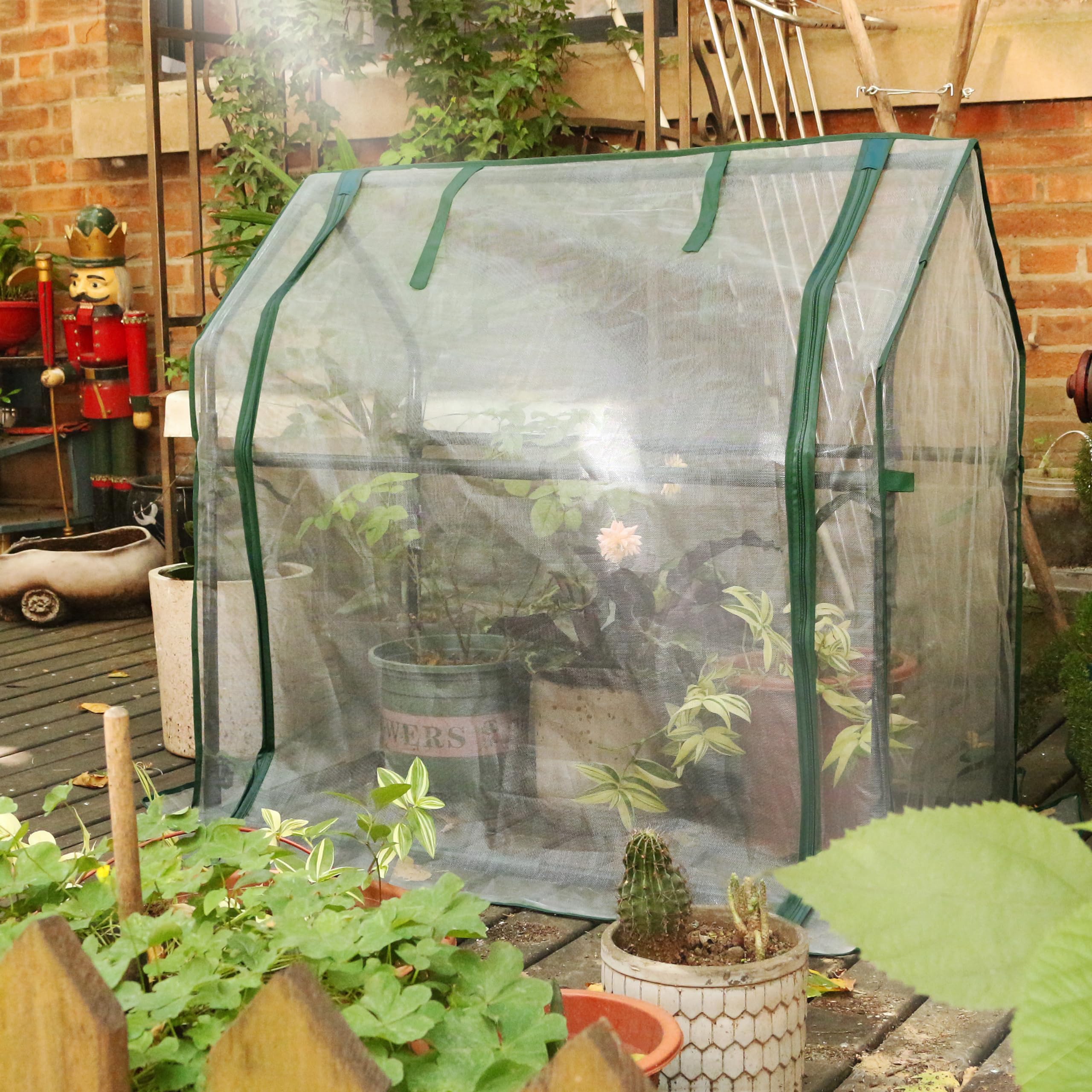 Gardzen mini greenhouse on balcony demonstrating compact outdoor gardening advantage