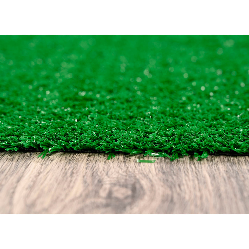 Garland Rug installed on patio creating a green outdoor living area and comfort