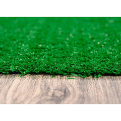 Garland Rug installed on patio creating a green outdoor living area and comfort