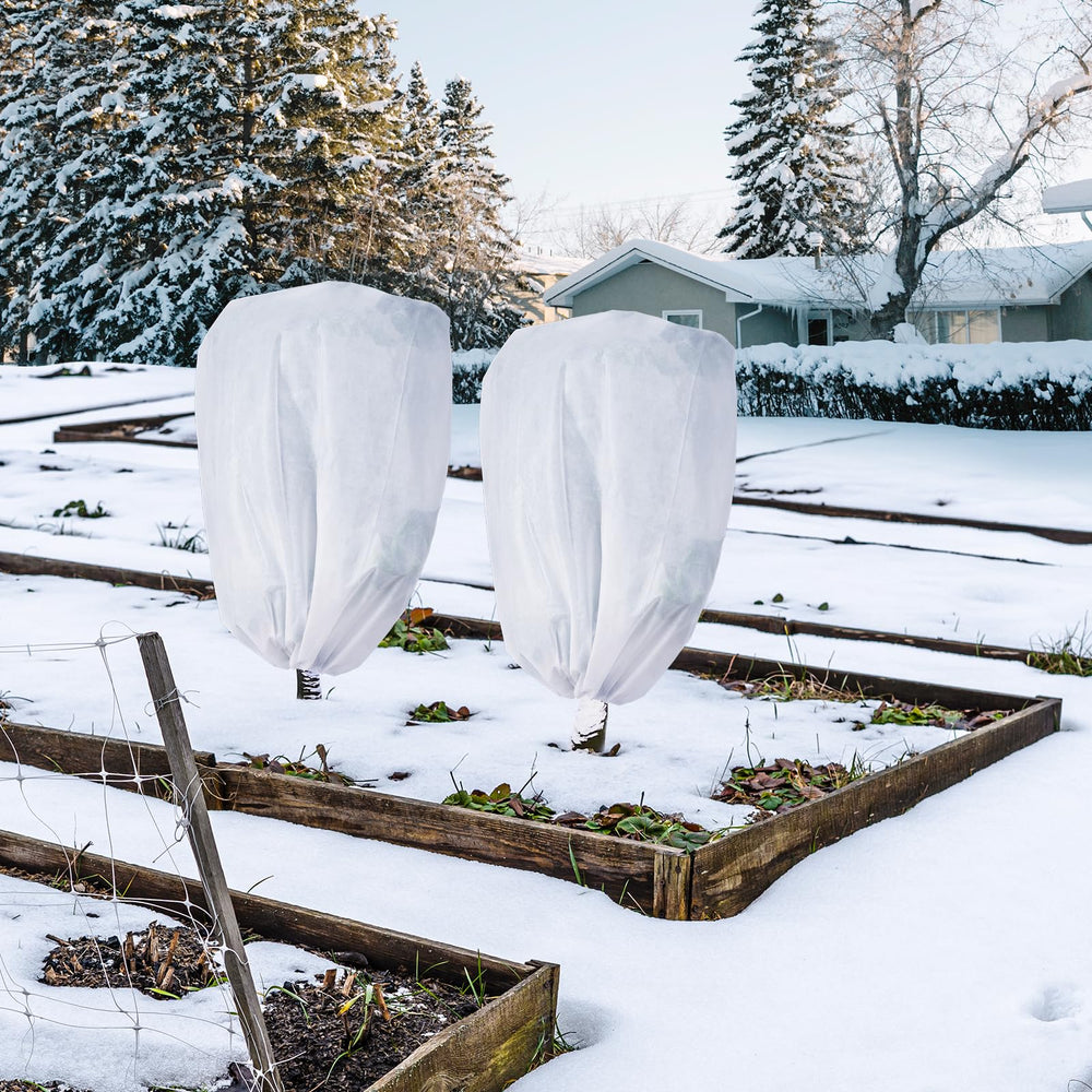 Garutom plant cover in winter garden setting shielding trees from cold and wind