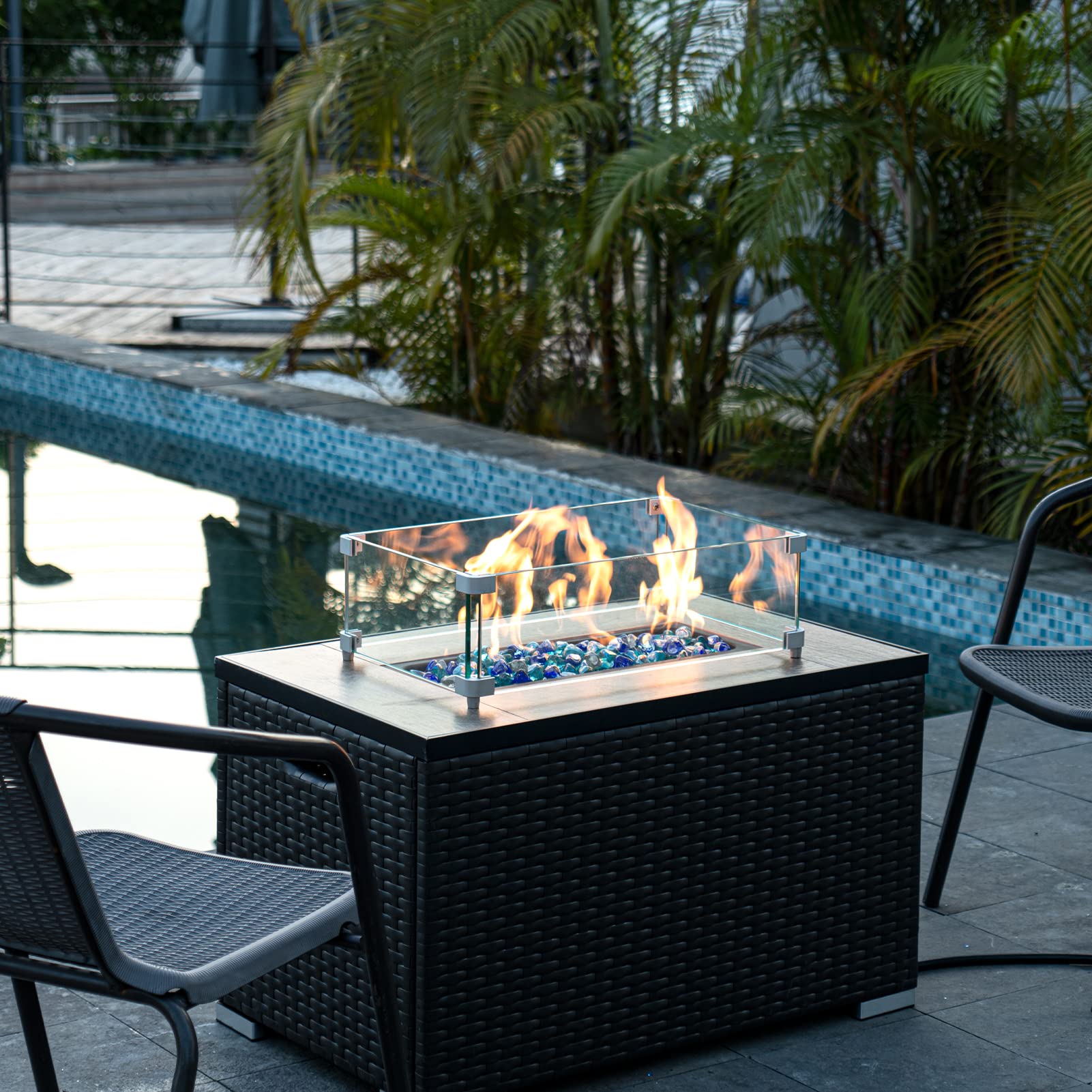 GASPRO glass in fire pit lit with flames reflecting color for brighter, jewel-like fire presentation