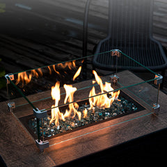 GASPRO fire pit lit with glass reflecting flames for dramatic ambience benefit