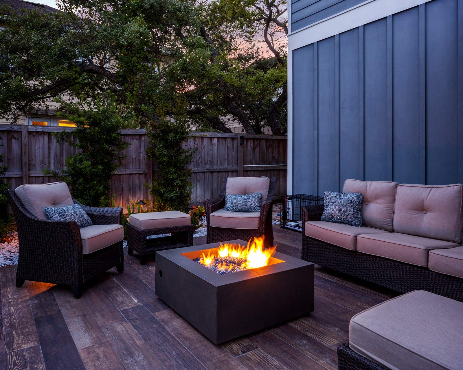 GASPRO glass in backyard fire table setting adding color and polished visual appeal