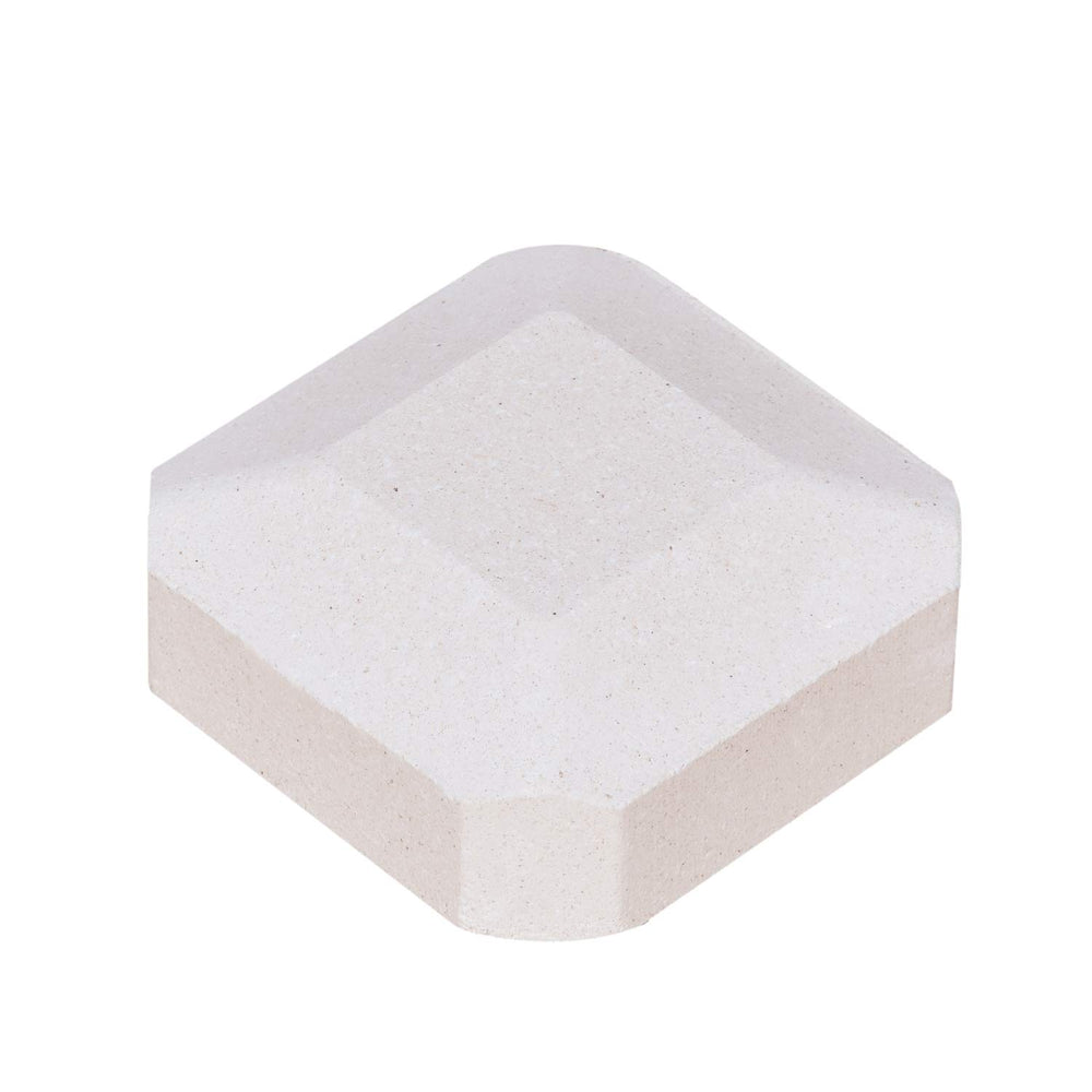 GasSaf briquette next to ruler showing 2x2 inch size for easy fit