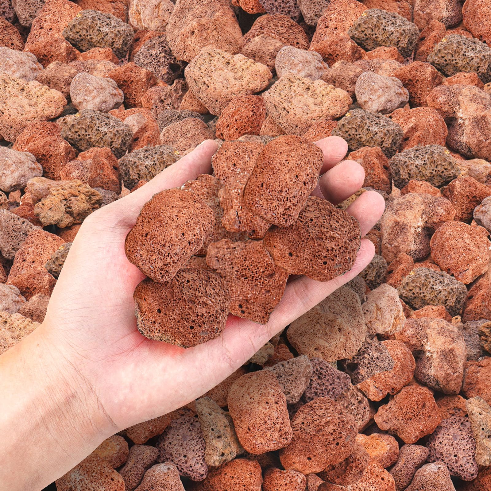 GasSaf lava rocks installed in fire pit hiding burners and enhancing flames