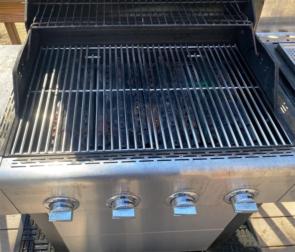 Gcostar grates in backyard grill setup with food on grate showing real-world cooking benefit