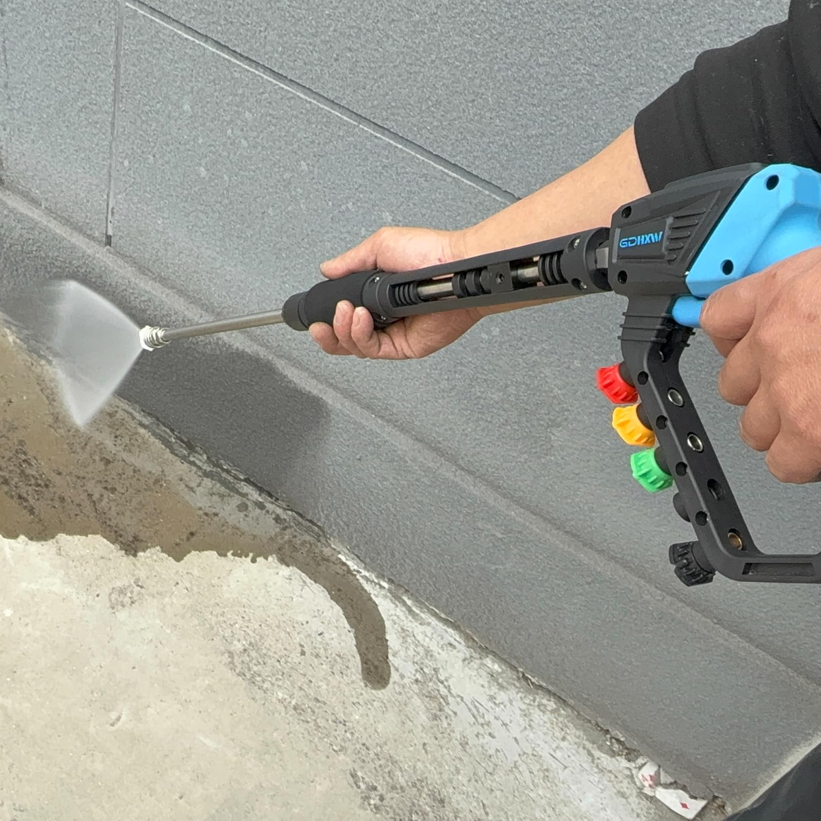 GDHXW pressure washer gun in use cleaning a wooden deck for powerful, efficient surface cleaning