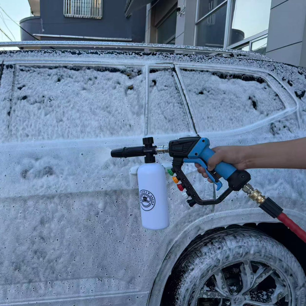 GDHXW pressure washer gun in use cleaning a driveway for efficient heavy-duty cleaning benefit