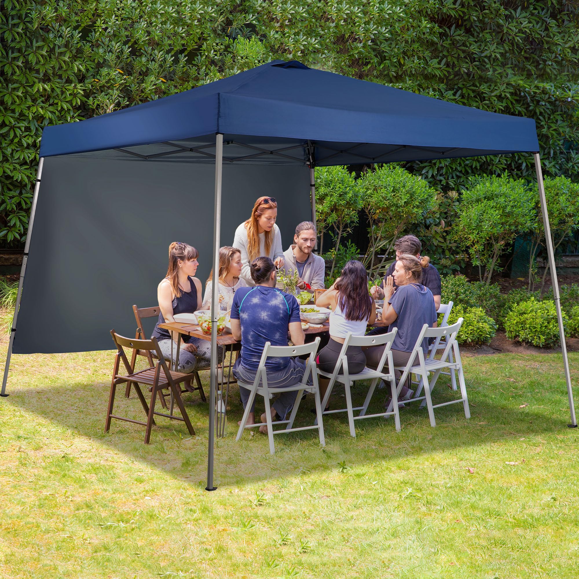GDY canopy set up on beach with people showing sun protection benefit