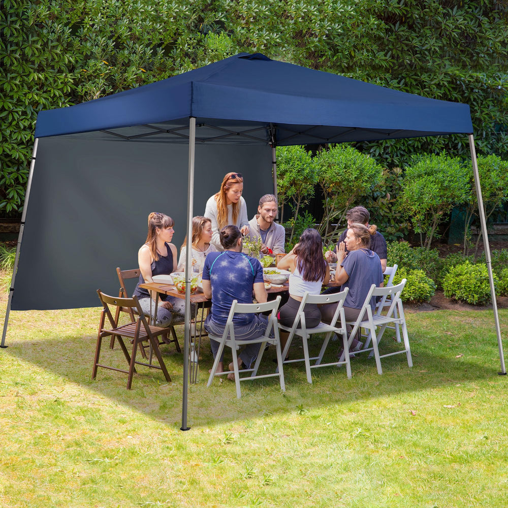 GDY canopy set up on beach with people showing sun protection benefit