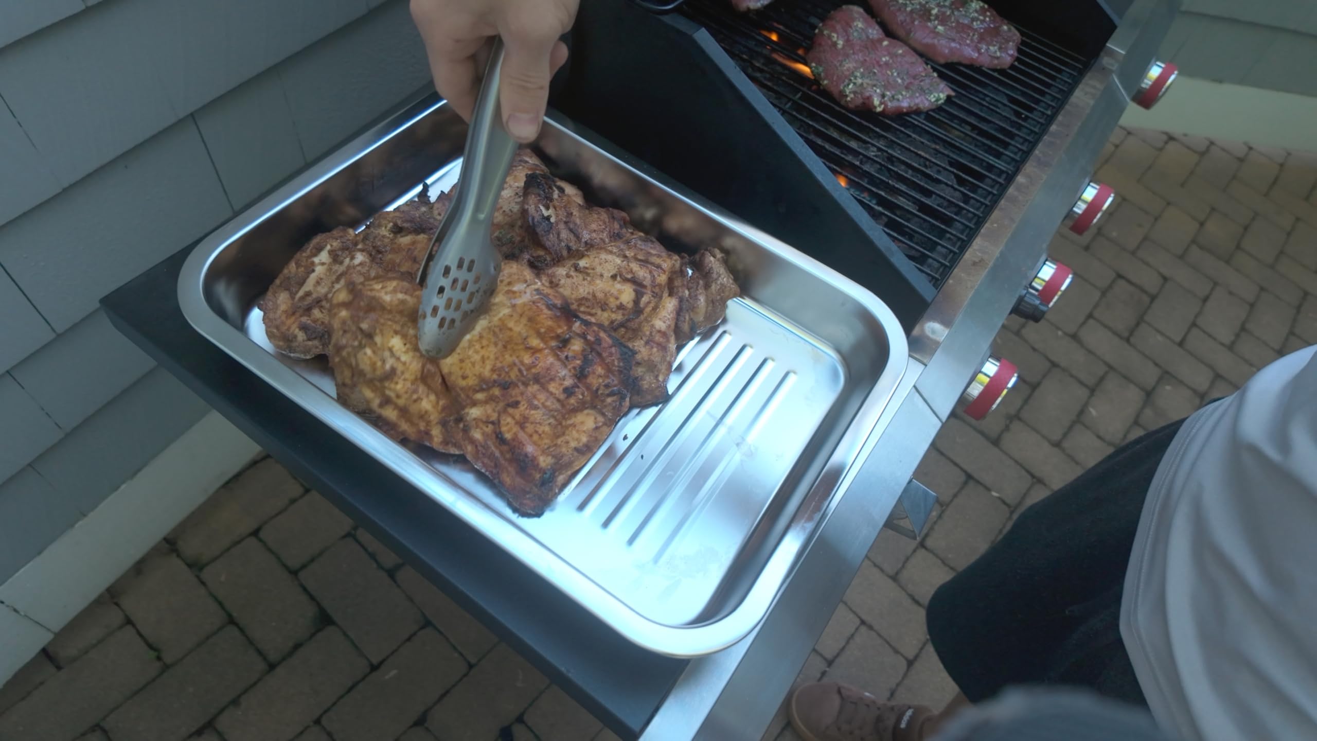 Geesta outdoor grill lifestyle setup showing efficient transport and serving