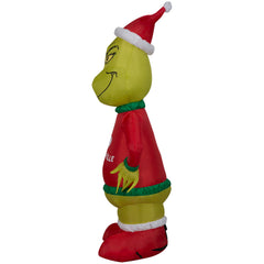 Gemmy Grinch lit at night with LEDs for bright energy-saving visibility