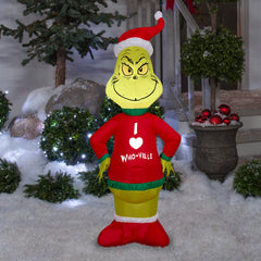 Gemmy Grinch sweater close-up highlighting Who-Ville heart detail and festive look